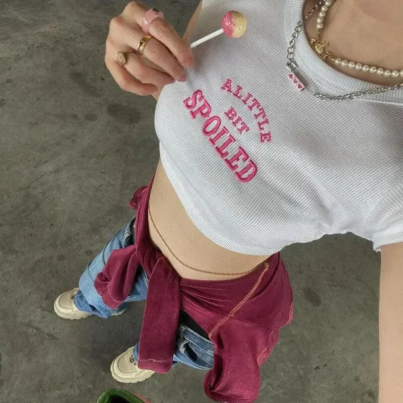 A Little Bit Spoiled Crop Top with Pink Embroidered Text